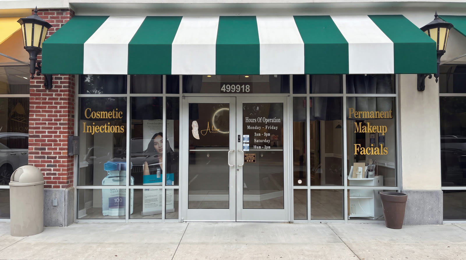 Exterior storefront of A&rsquo;Luxe Medical Aesthetics med spa at 4999 Carolina Forest Blvd, Suite 18 in Myrtle Beach, SC — green and white striped awning above glass doors lettered Cosmetic Injections, Permanent Makeup and Facials.